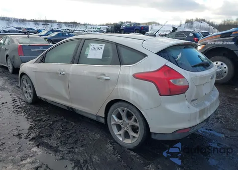 2014 Ford Focus Titanium z USA, uszkodzony, nr VIN 1FADP3N23EL399703